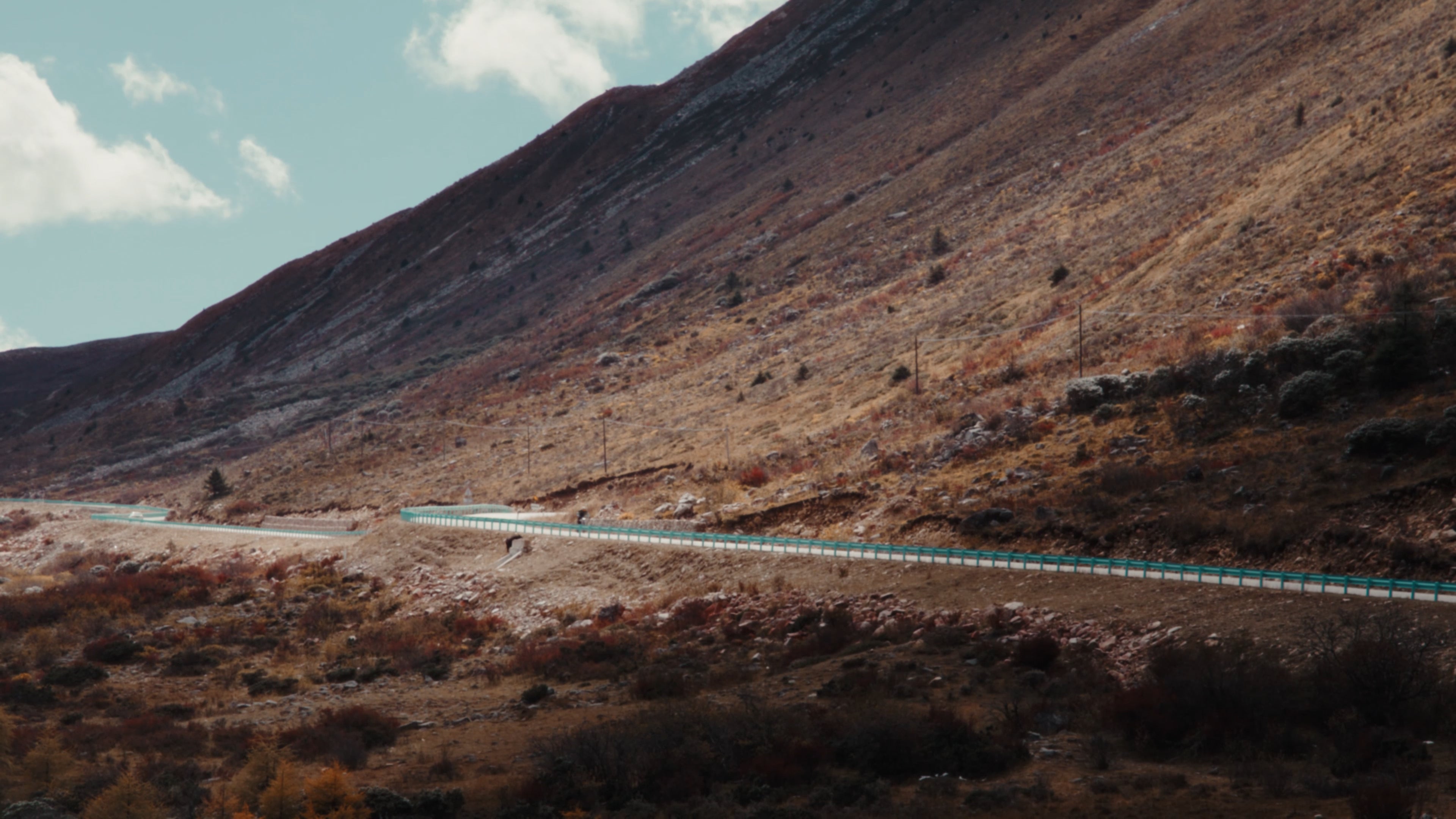 Surge V riding through mountain pass