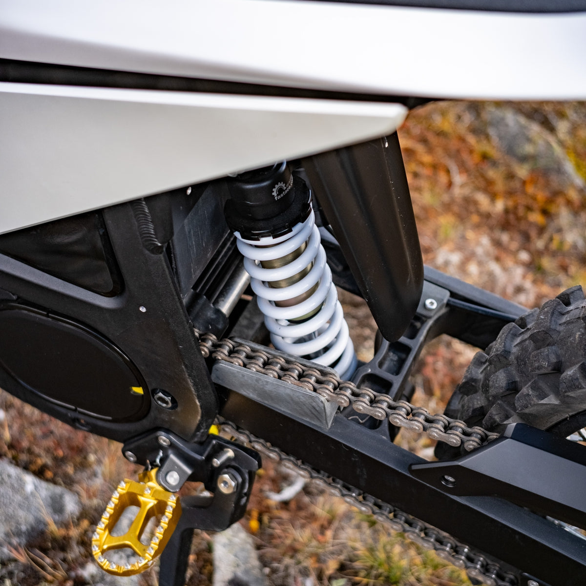 Surge V rear coil-spring shock and chain drive